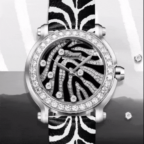 a chopard watch with a black and white zebra print strap