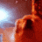 a close up of a blurred image of a person 's face in a dark room .