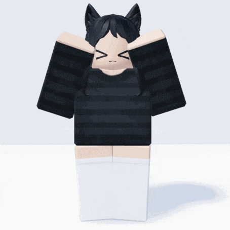 a girl with a cat ear and tail is wearing a black shirt and white knee high socks
