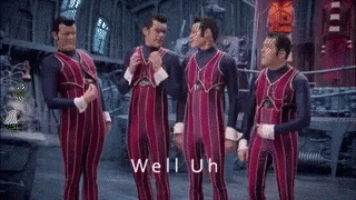 a group of men are standing next to each other in front of a sign that says yeah on it .