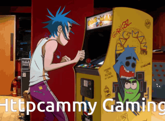 a man with blue hair playing a pac man game