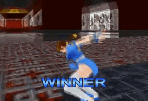 a video game screen shows a woman in a blue outfit and says winner