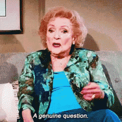 an elderly woman is sitting on a couch and says a genuine question