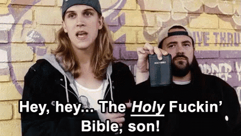 two men are standing next to each other holding a bible and saying hey hey the holy fuckin bible son .