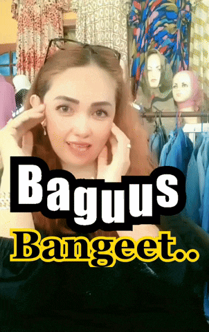 a woman is standing in front of a display of clothes and a sign that says bagus banquet