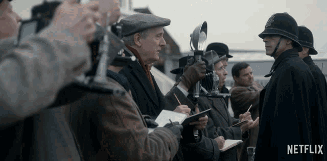 a netflix ad shows a group of men standing around taking notes