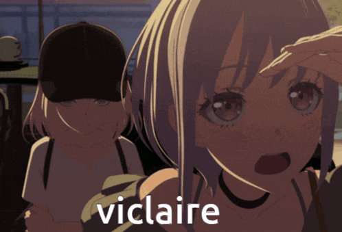 a girl with a surprised look on her face is standing next to another girl with the word vicaire on the bottom