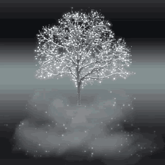 a tree with a lot of lights on it 's branches
