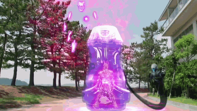 a person in a purple container with a sword coming out of it