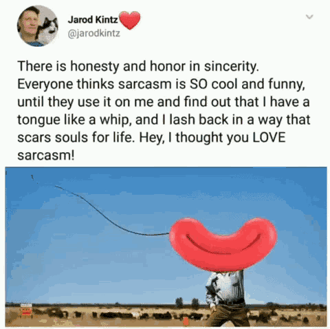 a tweet from jarod kintz with a picture of a sausage with a smiley face on it