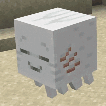 a white block with a face on it in a video game .