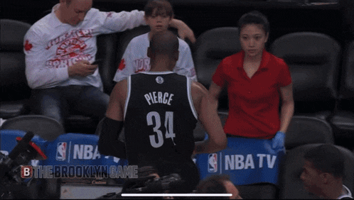 a man wearing a jersey that says pierce on it