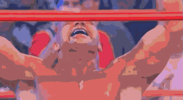 a man in a boxing ring with his eyes closed