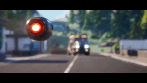a blurred image of a car driving down a road