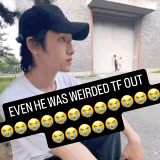 a man wearing a hat with the words even he was weirded tf out written on it