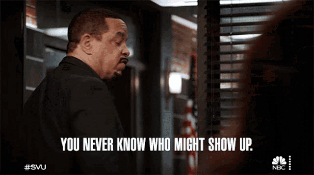 a man in a suit and tie says you never know who might show up