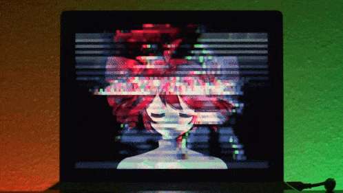 a computer screen shows a girl with a bow in her hair and the words " i 'm sorry "