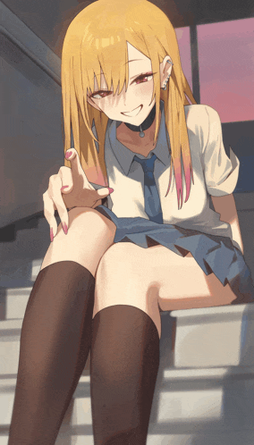 a girl with long blonde hair is sitting on some stairs