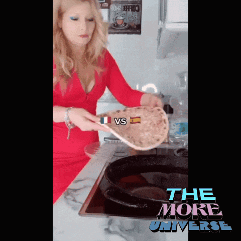 a woman in a red dress is holding a pizza over a pan with the words " the more universe " on the bottom