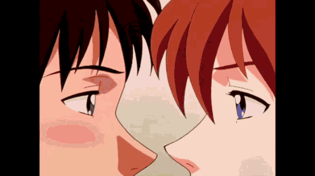 a man and a woman are looking at each other