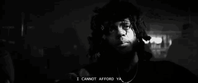 a black and white photo of a man with curly hair and the words `` i cannot afford ya ''