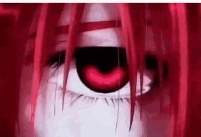 a close up of a person 's eye with a red eye .