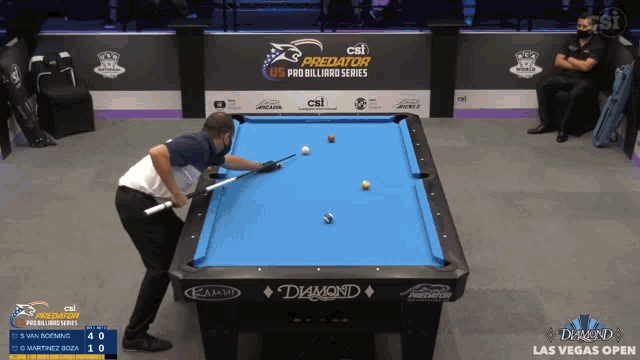 a man is playing pool at the csi predator pro billiard series