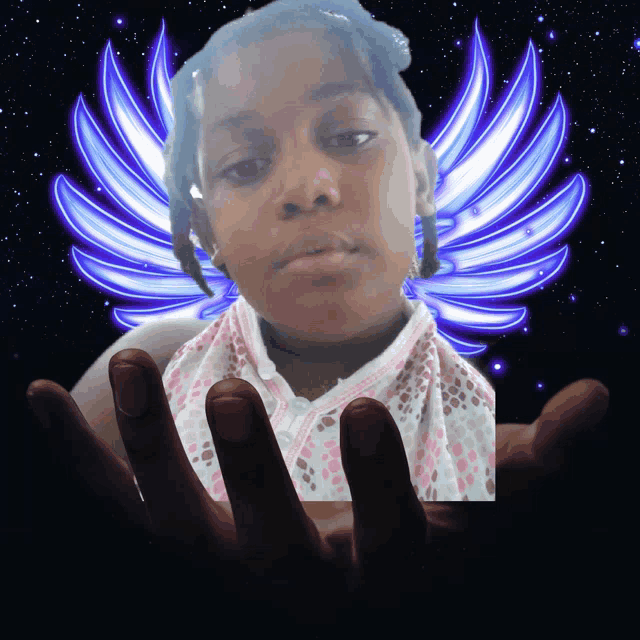a girl with a scarf around her neck is holding her hands out
