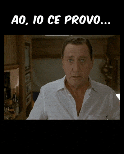 a man in a white shirt with the words " ao io ce provo " written above him
