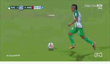 a soccer game is being played in a stadium with a banner that says lider en noticias