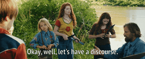 okay well let 's have a discourse with a group of people standing in the grass