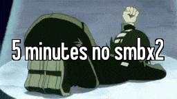 a person is laying on their stomach with a fist in the air .