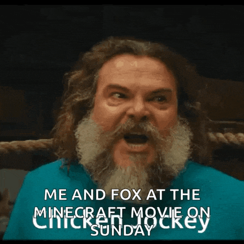 a man with a beard is making a funny face and says me and fox at the minecraft movie on chicken mickey