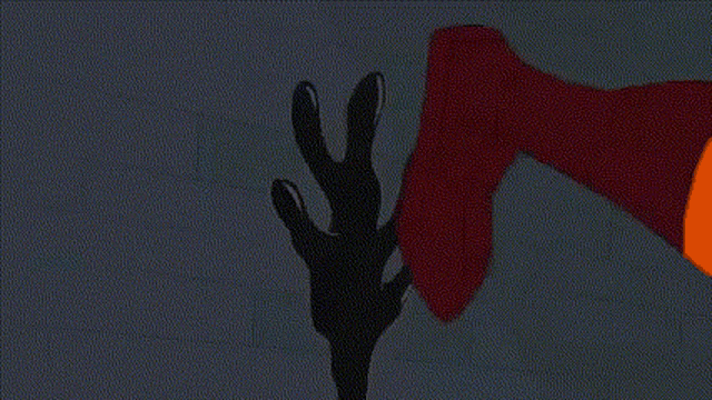 a drawing of a red and black object on a gray background with an orange circle in the middle .