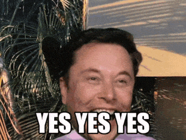 elon musk is smiling and says yes yes yes in front of a palm tree