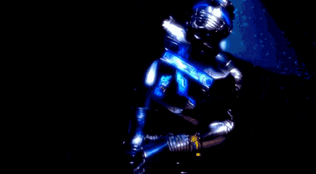 a blue background with a glowing object in the middle of it