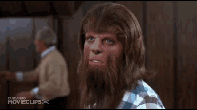 a man with a beard and a plaid shirt is featured in a fandango movieclip