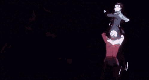 a couple of people are dancing on a red carpet on a stage .