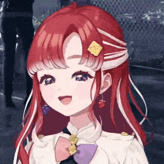 a close up of a girl with red hair and earrings