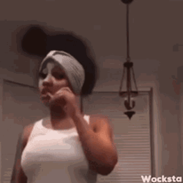two women are standing next to each other and the word wocksta is on the bottom