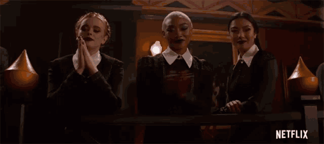 a group of three women standing next to each other with netflix written on the bottom