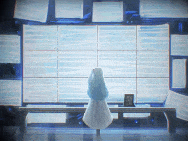 a girl in a white dress stands in front of a large wall
