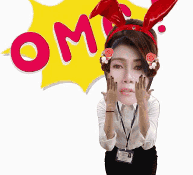 a woman wearing bunny ears and a headband with the word om on it