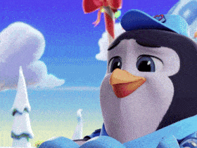a close up of a penguin wearing a blue hat with the letter s on it