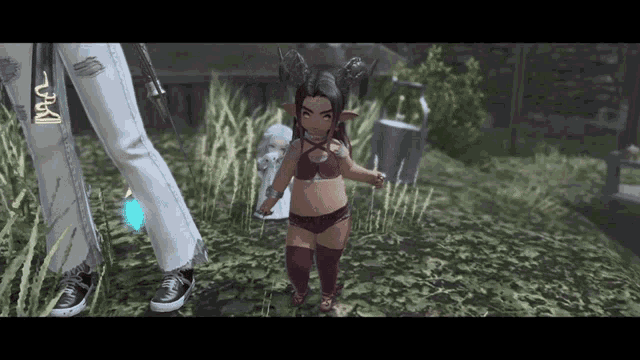 a little girl in a bikini with horns is standing next to a person with the letter k on their jeans