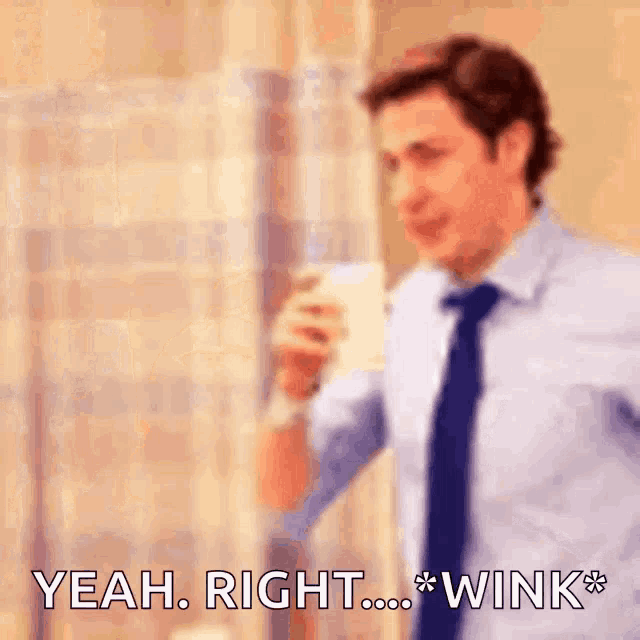 a man in a suit and tie is holding a cup of coffee and saying yeah right wink *