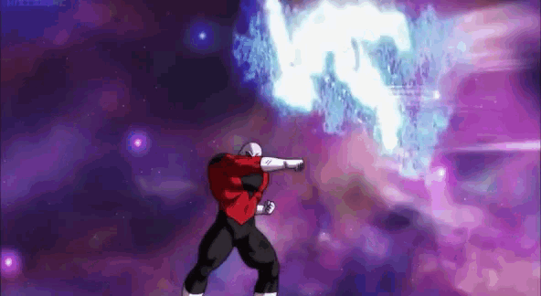 a man in a red shirt and black pants is standing in front of a purple background while holding a sword .