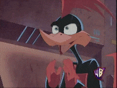 a cartoon character with a wb sticker on his chest