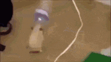 a blurred image of a person 's face with a light bulb in the background .