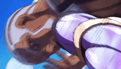 a close up of a person in a purple suit and helmet .